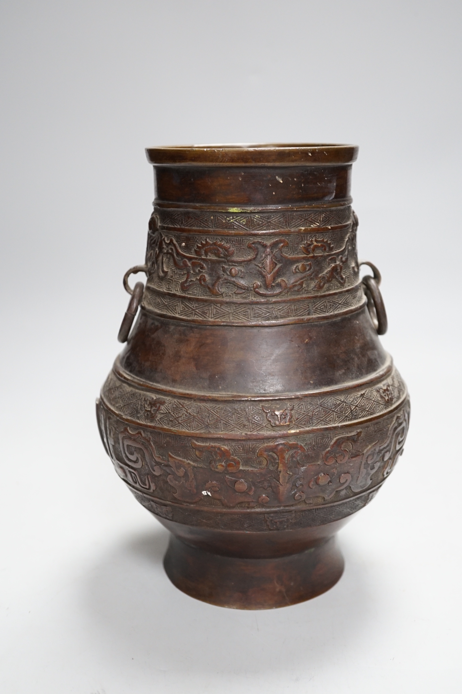 A Chinese archaistic bronze vase, hu, Xuande mark, 19th century, 24cm high